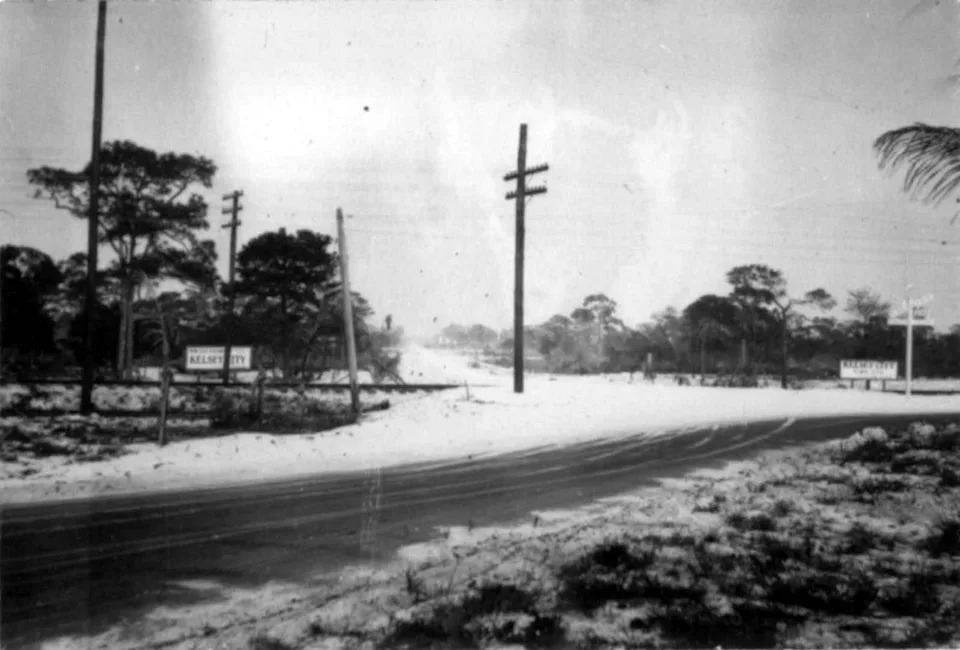 Old Dixie Highway at the entrance to Kelsey City along the FEC railroad tracks, now Lake Park, looking toward the southeast