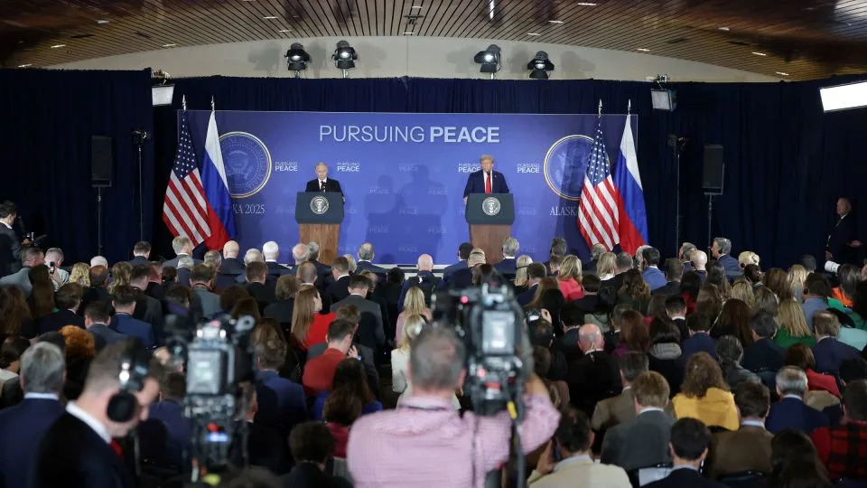 US President Donald Trump and Russian President Vladimir Putin hold a press conference following their meeting at Joint Base Elmendorf-Richardson in Anchorage, Alaska, on August 15, 2025. - Jeenah Moon/Reuters