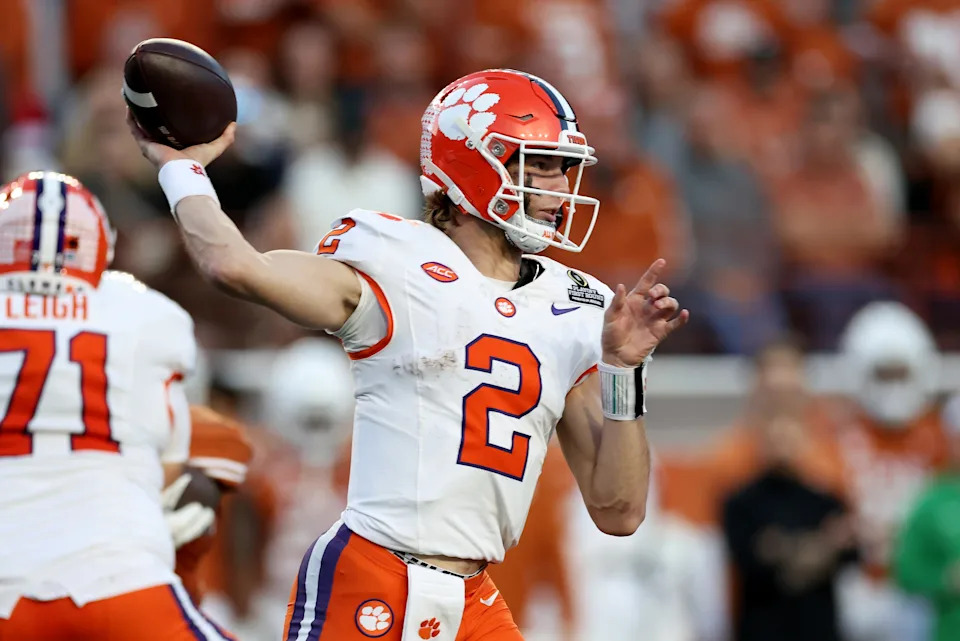 AUSTIN, TEXAS - DECEMBER 21: Cade Klubnik #2 of the Clemson Tigers throws a pass in the first half against the Texas Longhorns during the Playoff First Round Game at Darrell K Royal-Texas Memorial Stadium on December 21, 2024 in Austin, Texas. (Photo by Tim Warner/Getty Images)