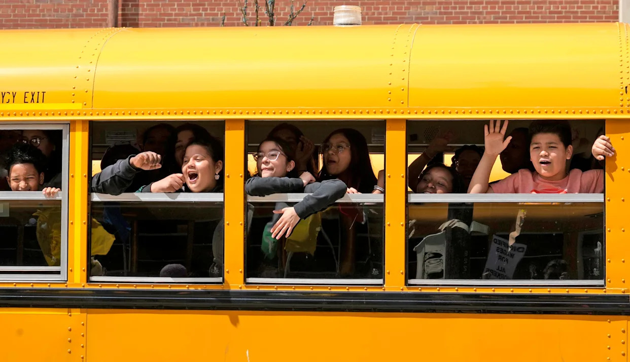 Why aren't school buses required by Wisconsin or the federal government to have seat belts?