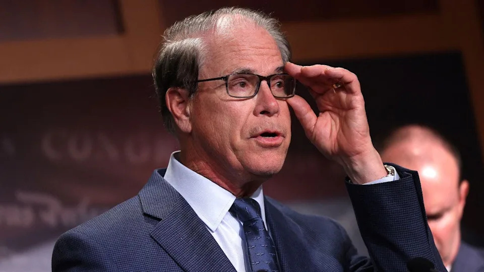 Mike Braun touching his glasses
