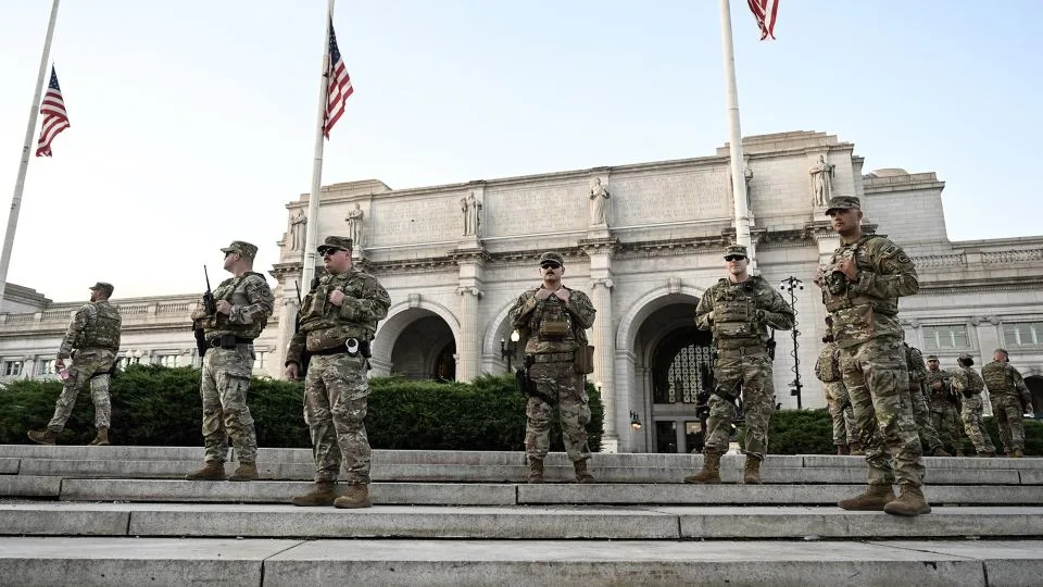National Guard troops and the Drug Enforcement Administration (DEA) patrol around the Union Station as part of heightened security measures in Washington, D.C., on August 28. - Fatih Aktas/Anadolu/Getty Images