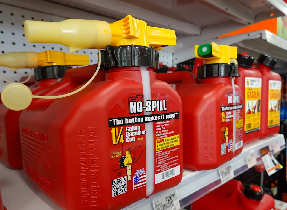 Gas cans designed to prevent spills, limit vapor emissions and protoect against accidental ignition sit on a shelf at a Denver-area hardware store on July 24, 2025.