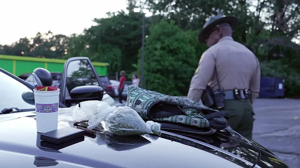 Marijuana, other paraphernalia piled on hood of car