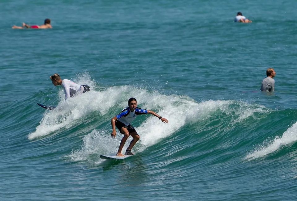Sebastian Inlet State Park surfers take advantage of the surf Aug. 18, 2025, in Brevard County, Florida. Swells from Hurricane Erin began on Monday, with the surf expected to build and peak on Wednesday. Hurricane Erin, currently a Category 4 storm, is expected to pass between the U.S. and Bermuda, bringing waves and rip currents to the area. Tuesday and Wednesday will likely see waves between 5-9 feet near the inlet, which might result in minor beach and dune erosion, especially around high tide and between 5 and 7 a.m. KAILA JONES /TCPALM