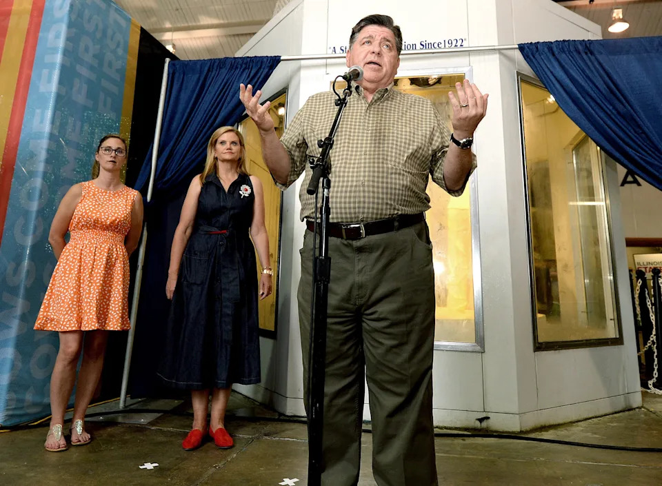 Gov. JB Pritzker takes questions from the assembled media after the unveiling of the Butter Cow. The sculpture was unveiled at the Dairy Building on Aug. 6, 2025 as a lead-up to the State Fair.
