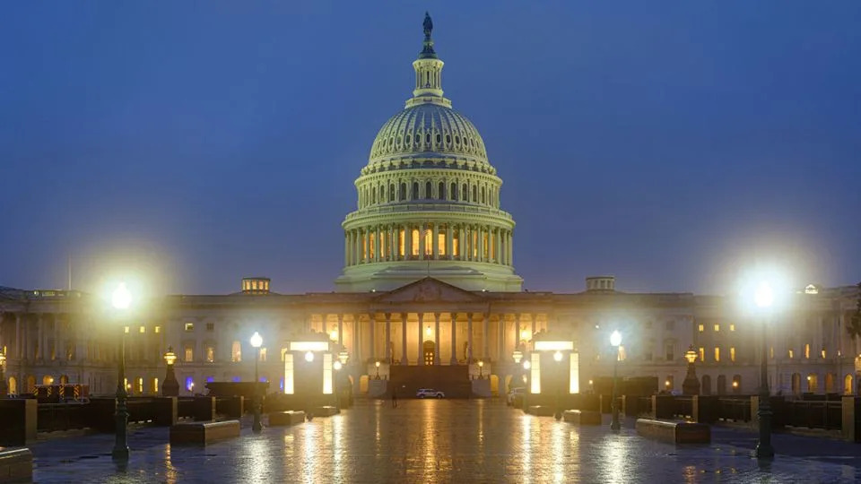 The US Capitol building is shrouded in the early morning rain and mist on May 14, 2025, in Washington, DC. - J. David Ake/Getty Images