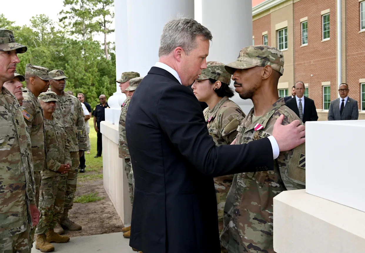 Unarmed soldiers tackled and subdued gunman, Army secretary says