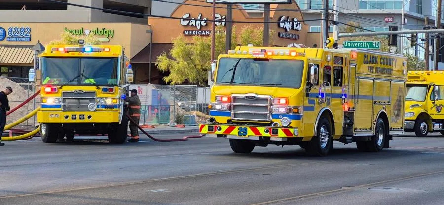 Clark County fire crews battle a large blaze at a business complex across the street from the UNLV campus on Maryland Parkway, near Tropicana Avenue on July 25, 2025. (KLAS)