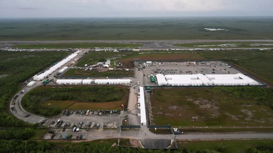 Work progresses on a new migrant detention facility dubbed "Alligator Alcatraz," at Dade-Collier Training and Transition facility in the Florida Everglades on July 4. - Rebecca Blackwell/AP
