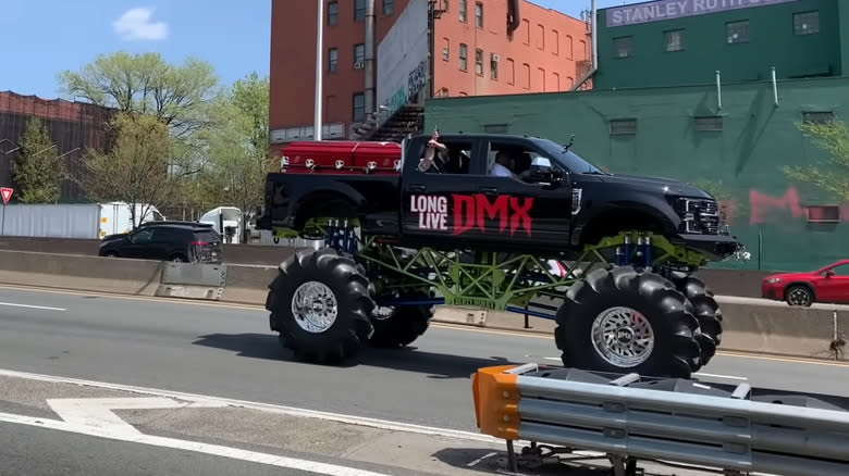 DMX's black Ford F250 monster truck hearse driving down the Major Deegan Expressway