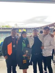 Marisela Marquez Alonso and her brothers at her graduation ceremony at Portland State University in 2022. (Photo courtesy of Marisela Marquez Alonso).