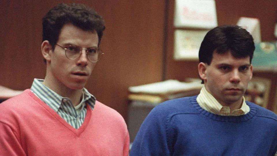 Erik (left) and Lyle Menendez listen during a pretrial hearing, in Los Angeles on December 29, 1992. - Vince Bucci/AFP/Getty Images