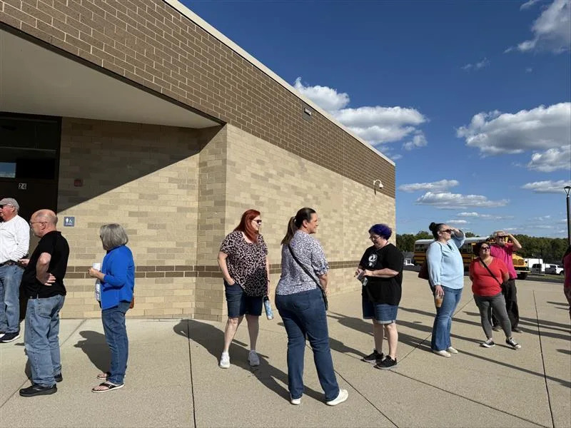 Many of the dozens of people who lined up outside Edgewood Middle School were Democrats.