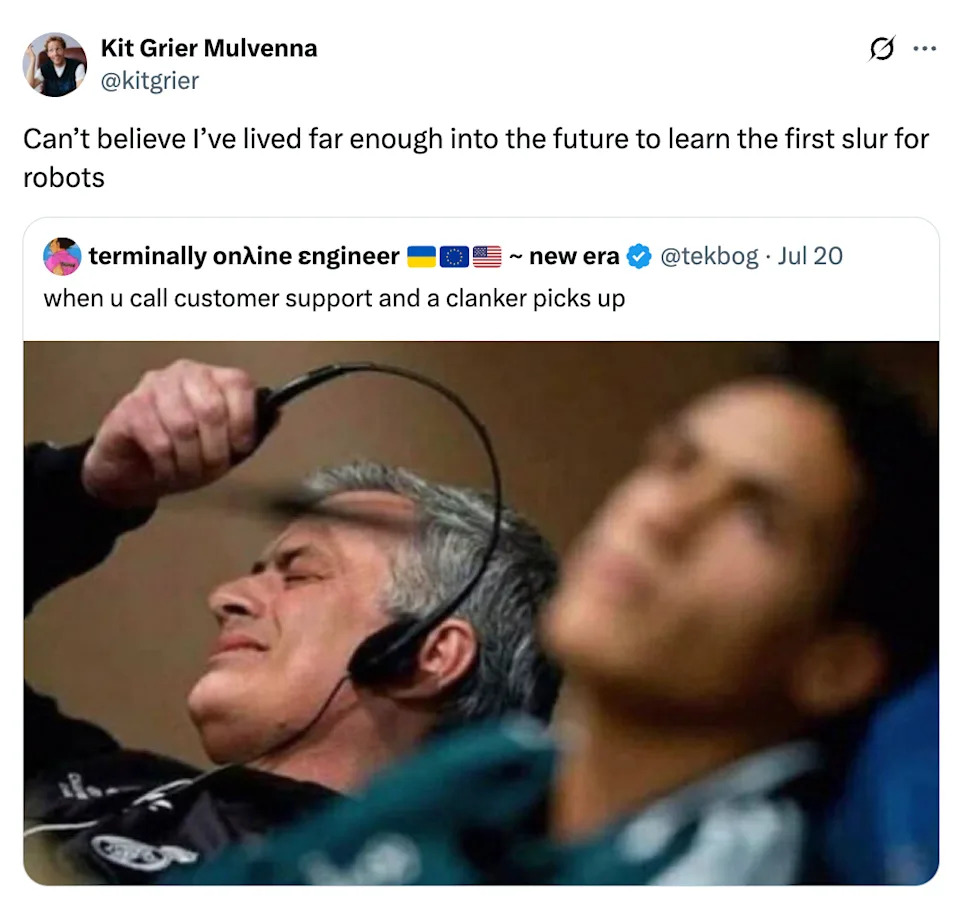 A man wearing a headset appears frustrated while another person is out of focus in the foreground. Text joke about robot slur on social media above image