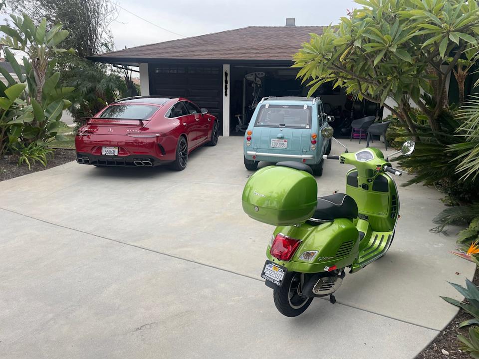 lime green vespa and two other cars