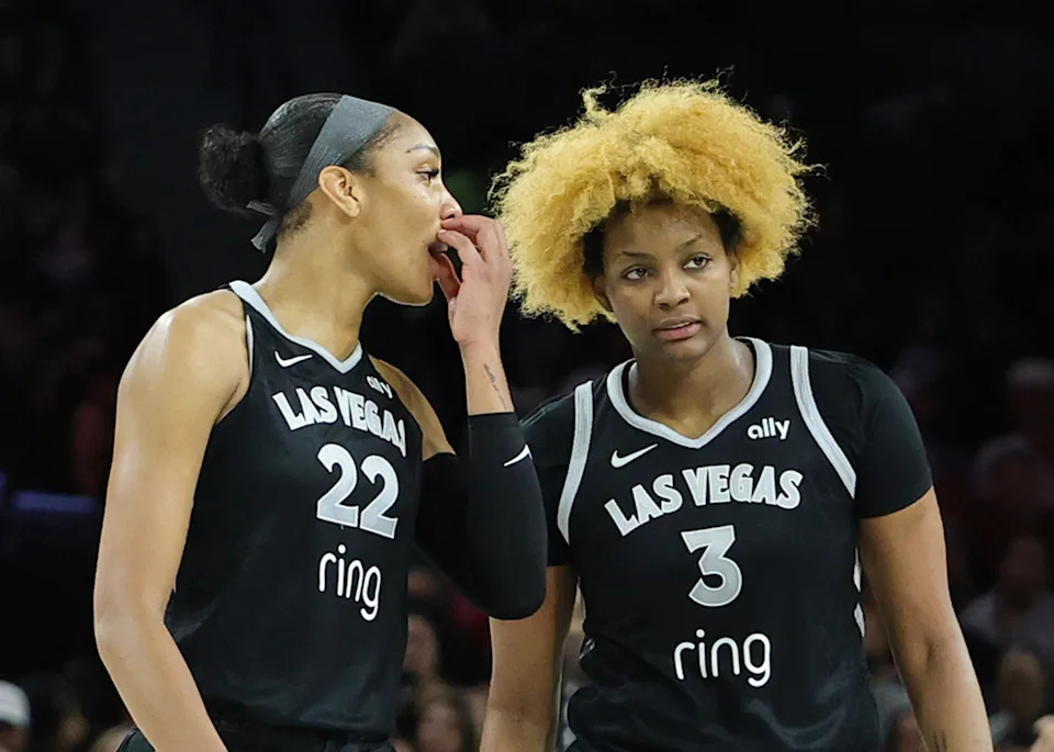 LAS VEGAS, NEVADA - AUGUST 21: A'ja Wilson #22 and NaLyssa Smith #3 of the Las Vegas Aces talk on the court after the Phoenix Mercury lost a coach's challenge on a foul call in the third quarter of their game at Michelob ULTRA Arena on August 21, 2025 in Las Vegas, Nevada. The Aces defeated the Mercury 83-61. NOTE TO USER: User expressly acknowledges and agrees that, by downloading and or using this photograph, User is consenting to the terms and conditions of the Getty Images License Agreement. (Photo by Ethan Miller/Getty Images)