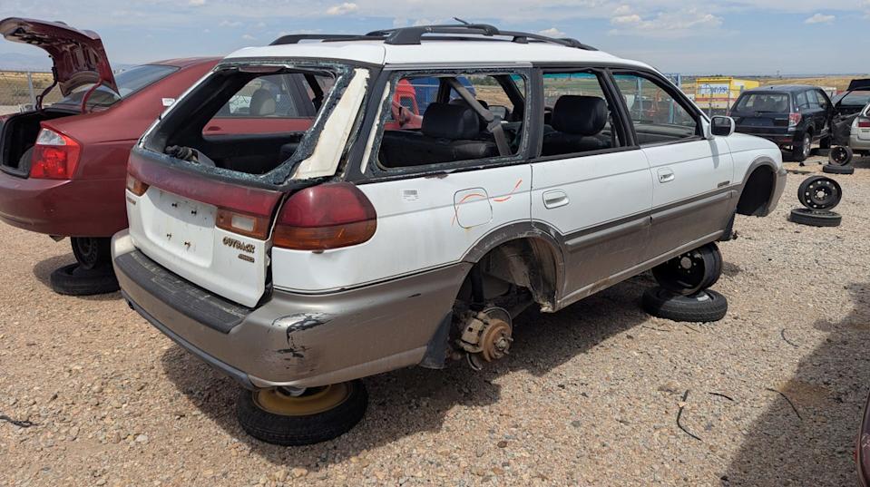 1998 subaru legacy outback wagon with 500k miles in colorado junkyard
