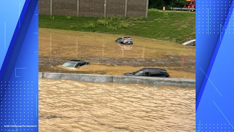Cars drive through flooded highway in Chattanooga