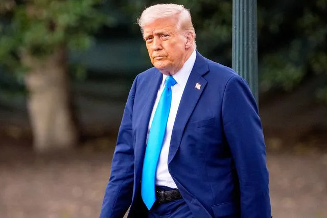 Andrew Harnik/Getty Donald Trump walks towards Marine One at the White House on March 28, 2025 in Washington, DC. Trump is headed to Mar-a-lago in Palm Beach, Florida for the weekend