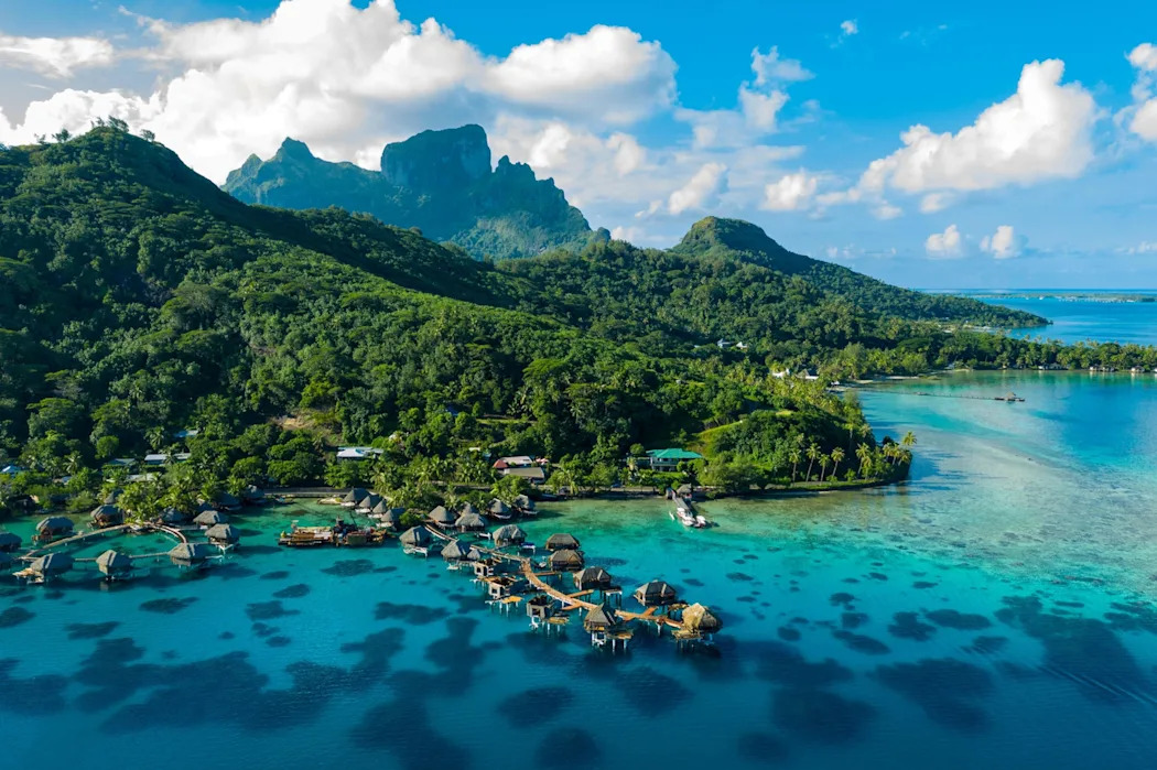 Adventurous travelers can summit Mount Otemanu in Bora Bora, one of 118 islands and atolls in French Polynesia.