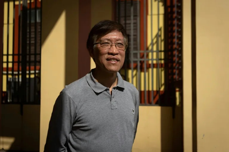 Au Kam-san, a primary school teacher who became one of Macau's longest-serving pro-democracy legislators, poses for a photo in 2024 (Eduardo Leal)