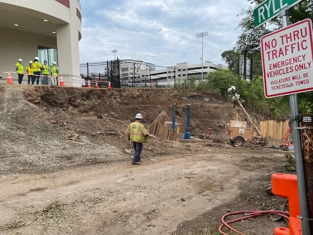The excavation hole at Hinchliffe Stadium in Paterson on Thursday morning, where a broken water main has been removed. At midday, the crew was awaiting the arrival of the new pipes, which are being trucked from Alabama.