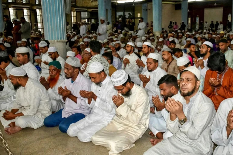 Muslims offer a special prayer at the Baitul Mukarram National Mosque in Dhaka for the victims of the plane crash (Rafiqul ISLAM)