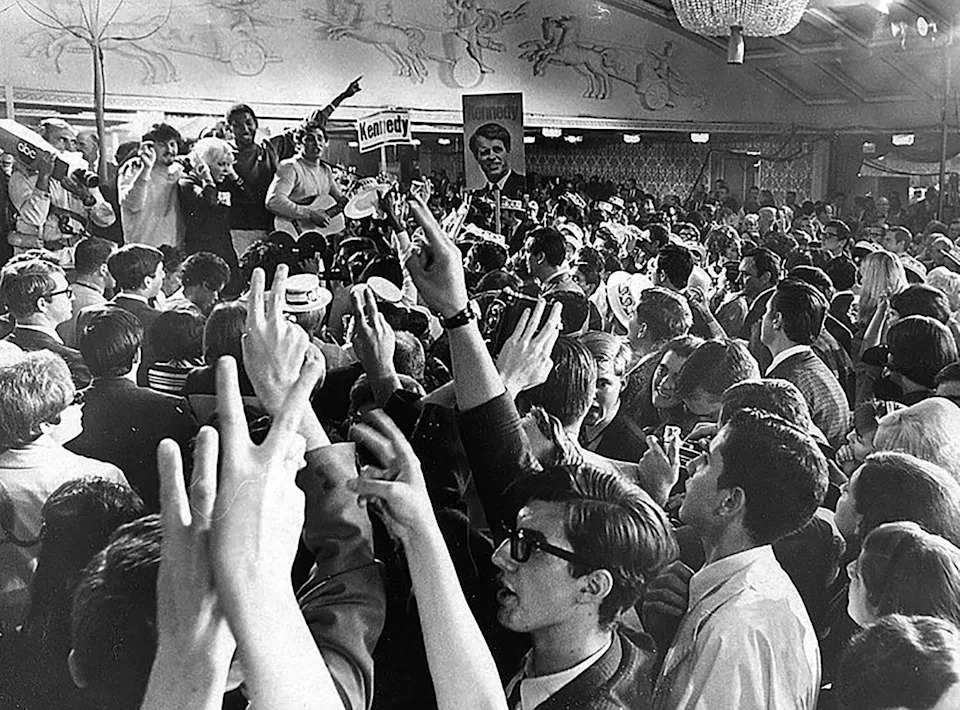 Kennedy volunteers and supporters celebrate inside the Ambassador Hotel on June 4, 1968.