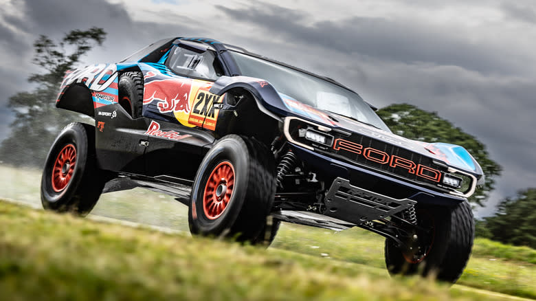 The Ford Raptor T1+ rally racer seen in front three-quarter view
