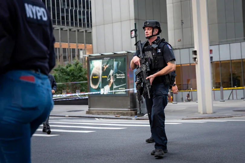 The scene on the corner of Lexington Avenue and 53rd Street, near 345 Park Avenue where a New York Police Department police officer was shot, Monday, July 28, 2025, in New York. / Credit: Angelina Katsanis / AP