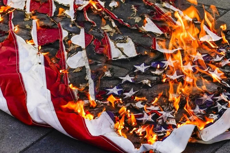 What are the consequences of burning the American flag after Trump’s executive order?