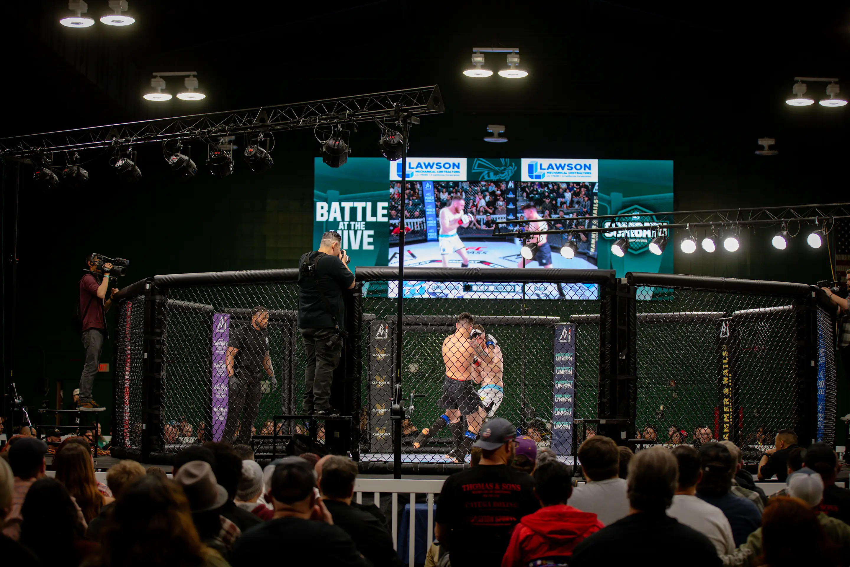 Sacramento State alumnus Daniel Black (white shorts) fights Joaquin Campbell-Holguin at the inaugural