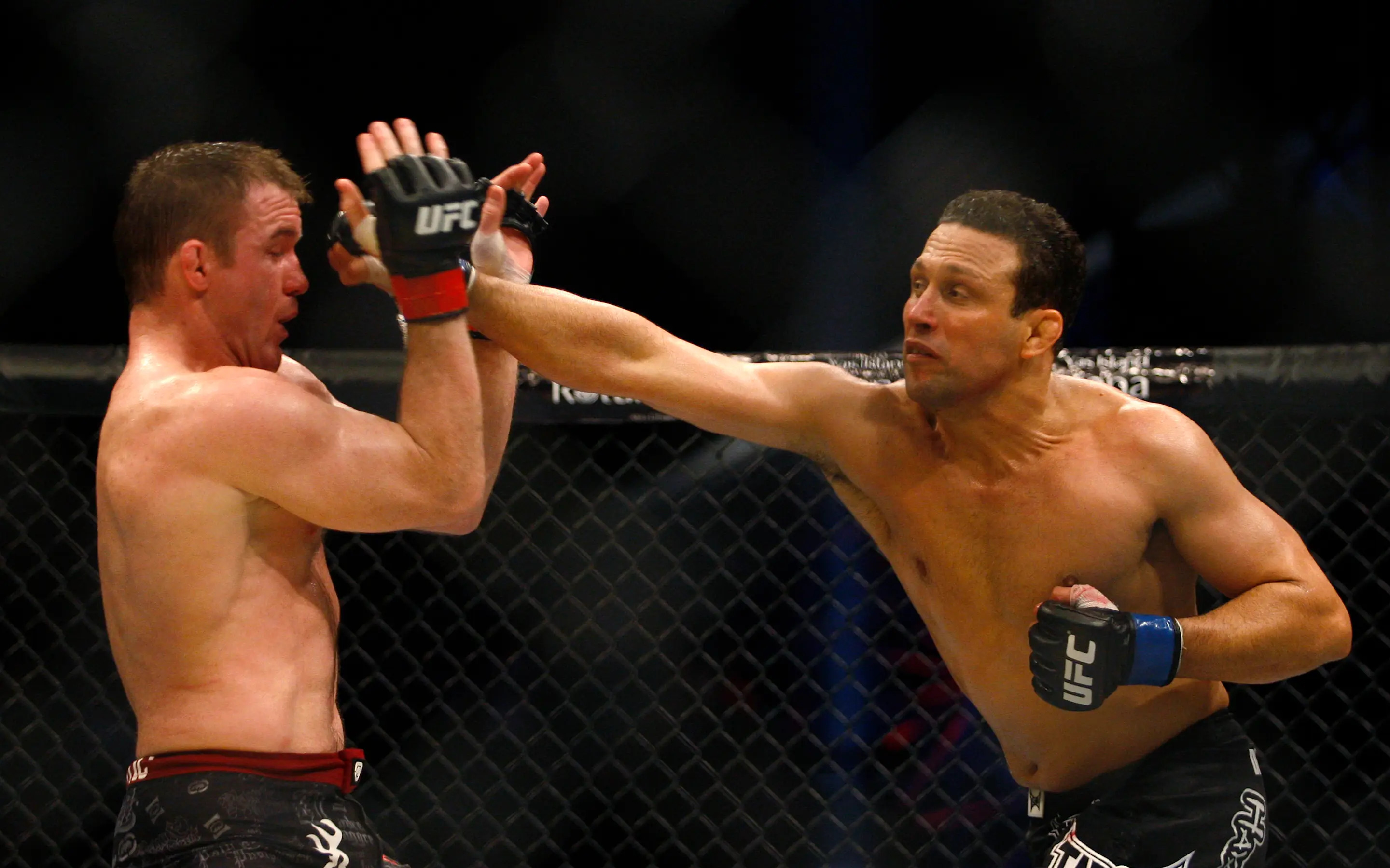 Matt Hughes (L) of the U.S. counters Brazilian Renzo Gracie's punch during their bout in the Ultimate Fighting Championship tournament in Abu Dhabi April 10, 2010. REUTERS/Mohammed Salem (UNITED ARAB EMIRATES - Tags: SPORT)