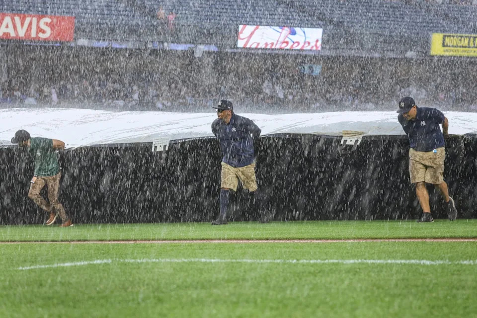 Major storms hit New York City and the East Coast on Thursday, leading to flight delays and commuter chaos. The Yankees game had to go into a rain delay (Copyright 2025 The Associated Press. All rights reserved.)