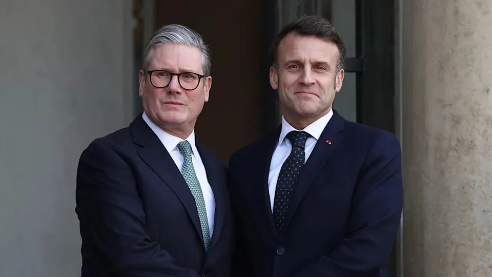 French President Emmanuel Macron welcomes British Prime Minister Keir Starmer (L) during a meeting on the situation in Ukraine and security issues in Europe at the Elysée Palace on Feb. 17, 2025 in Paris, France.