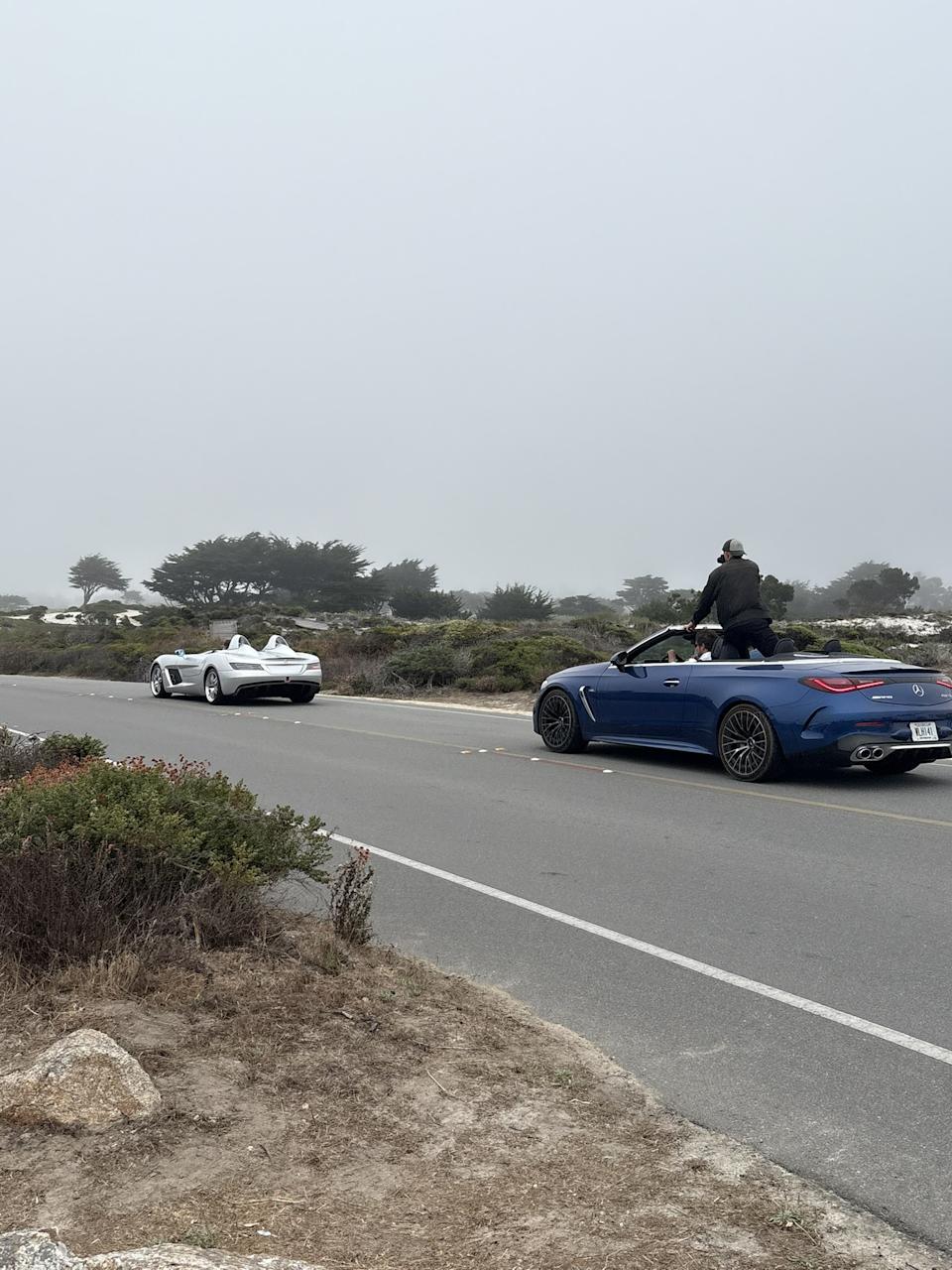 Mercedes-Benz SLR McLaren Stirling Moss chased by photographers