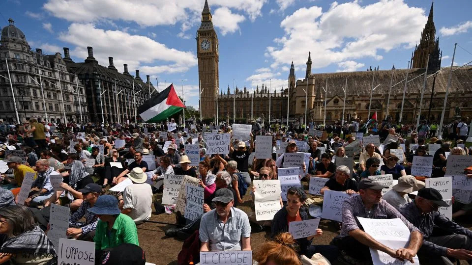 People attend a rally challenging the British government's proscription of the activist group Palestine Action in London on Saturday, - Jaimi Joy/Reuters
