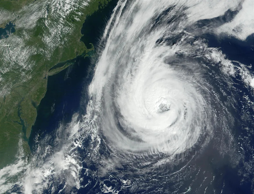 Hurricane Erin passes the East Coast on Sept. 11, 2001. On the left side of the photo, smoke can be seen from the terrorist attacks on the World Trade Center.