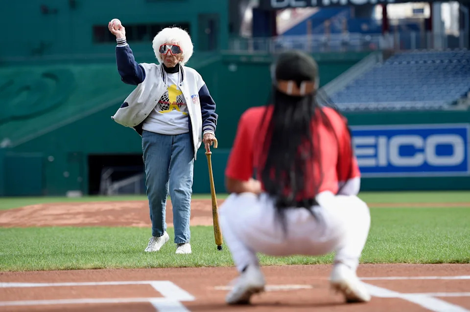 Maybelle Blair, who played in the All-American Girls Professional Baseball League, throws out the ceremonial first pitch to Mo'ne Davis prior to WPBL tryouts on Monday at Nationals Park. (Photo by Hannah Foslien/MLB Photos via Getty Images)