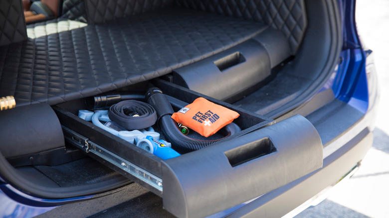 Dog accessories in the Nissan Rogue Dogue compartment