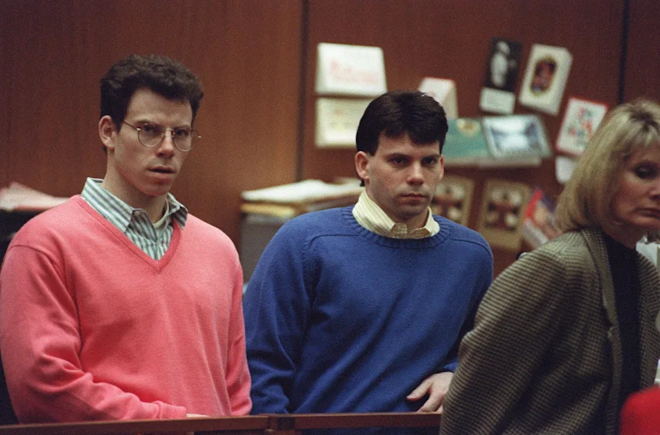 Erik Menendez (L) and his brother Lyle (R) listen during a pre-trial hearing