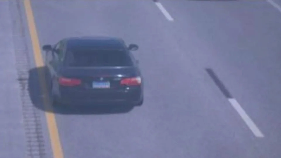 An image captured by a license plate reader placed by the Scott County Sheriff's Office shows the BMW on Interstate 80 near Wolcott, Indiana, at 3:42 pm CDT. - Obtained by CNN