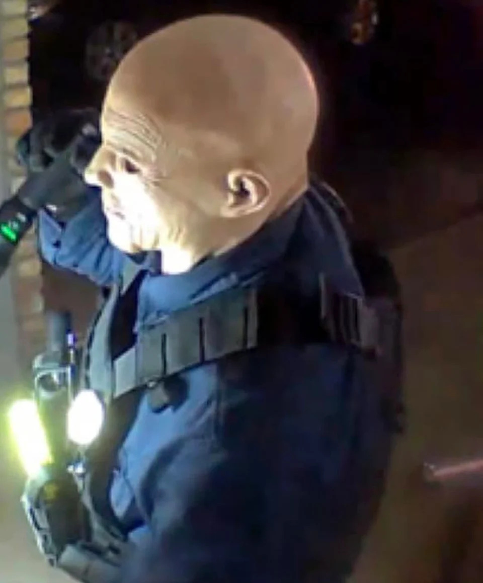 Footage shows a man matching the description of shooting suspect Vance Luther Boelter attempting to gain access to one of the victims' homes.  (FBI)