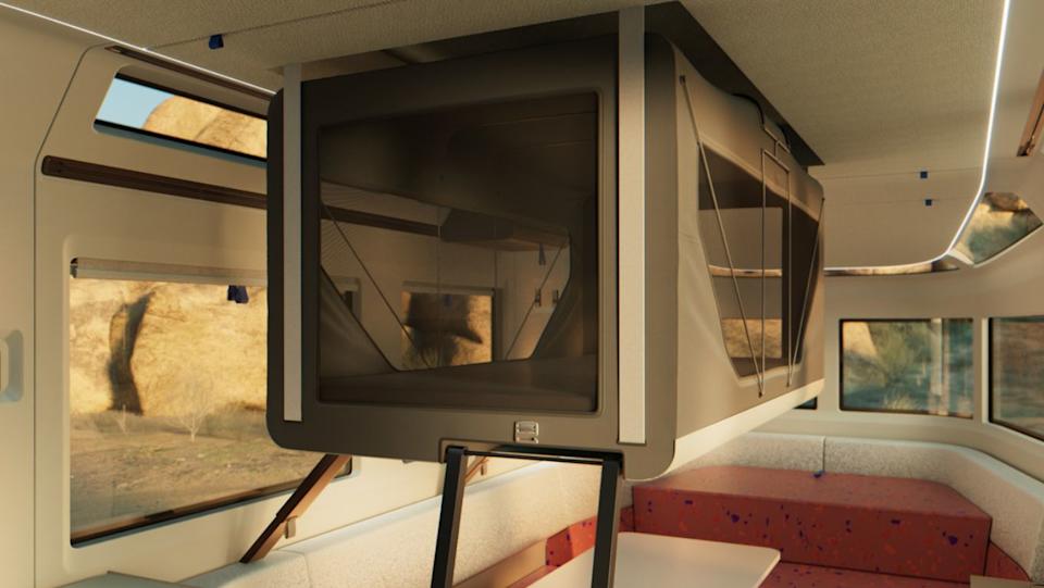 interior of a compact camper van showcasing a foldable sleeping area