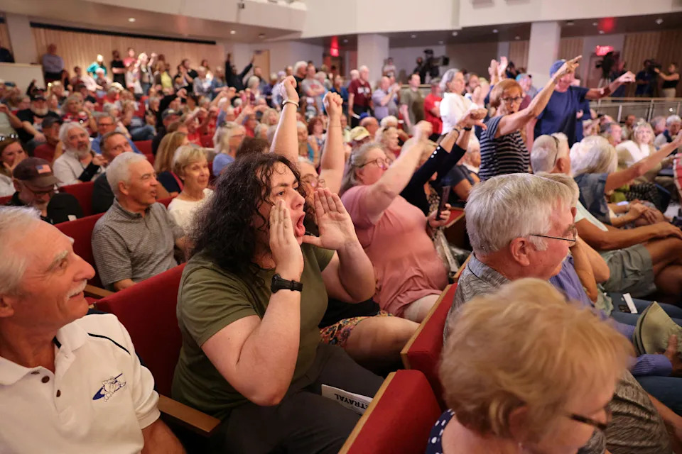 U.S. Representative Mike Flood (R-NE), answers questions from constituents during a town hall in Lincoln, Nebraska (Scott Morgan / Reuters)