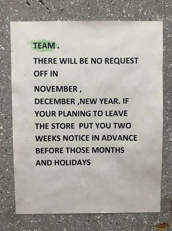 Sign on wall stating no time off requests in November, December, or before holidays; plan two weeks in advance