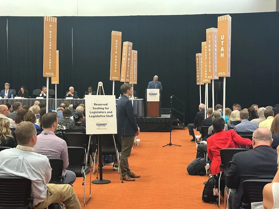  Tim Storey, the chief executive officer of the National Conference of State Legislatures, leads the organization’s business meeting at the Thomas Michael Menino Convention and Exhibition Center on Aug. 6 in Boston. (Photo by Kevin Hardy/Stateline)