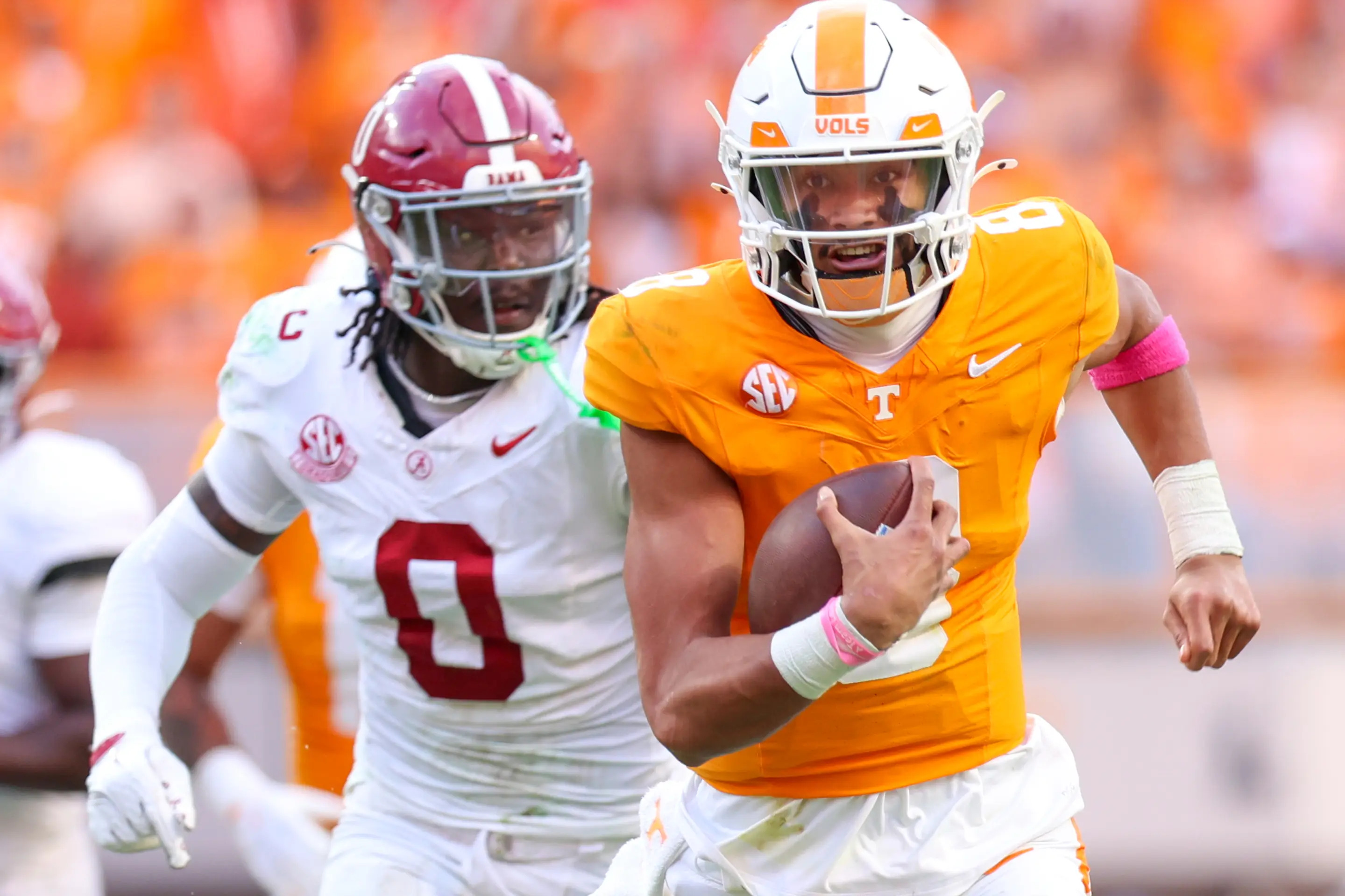 KNOXVILLE, TN - OCTOBER 19: Nico Iamaleava #8 of the Tennessee Volunteers carries the ball during a game between Alabama and Tennessee at Neyland Stadium on October 19, 2024 in Knoxville, Tennessee. (Photo by Roger Wimmer/ISI Photos/Getty Images)