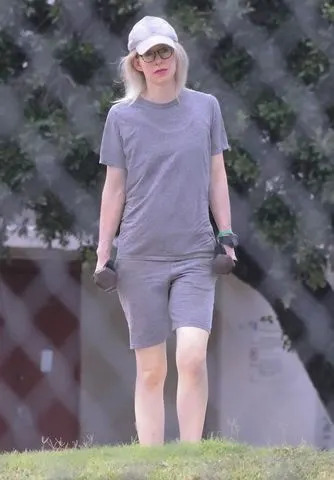 BACKGRID Elizabeth Holmes works out in the yard at Federal Prison Camp Bryan in Bryan, Texas, on Aug. 2.